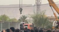 Public execution in Iran using a crane.