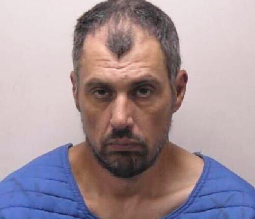 Surveillance footage of Walmart stabbing suspect.