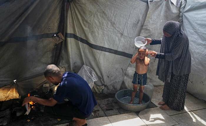 Heat and thirst drive families in Gaza to drink water that makes them sick