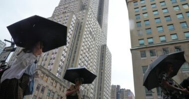 Heavy rain pummels the East Coast and sparks isolated flash flooding