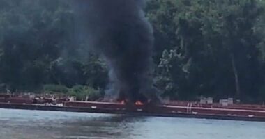Helicopter crash on barge.