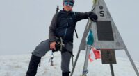 Luca Sanigaglia at a mountain summit.