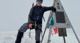 Luca Sanigaglia at a mountain summit.