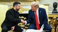 Zelensky and Trump shaking hands in the Oval Office.