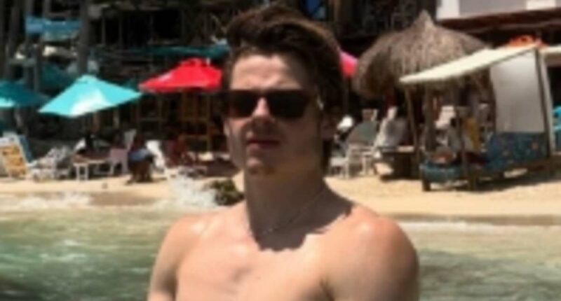 Hollywood star's nepo baby son reveals ripped torso while on holiday