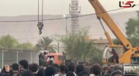 Horrifying moment Iranian 'killer' is publicly hanged from a crane