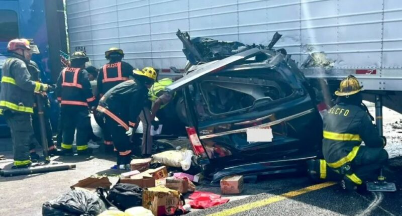 Minivan crushed in collision with tractor-trailer.
