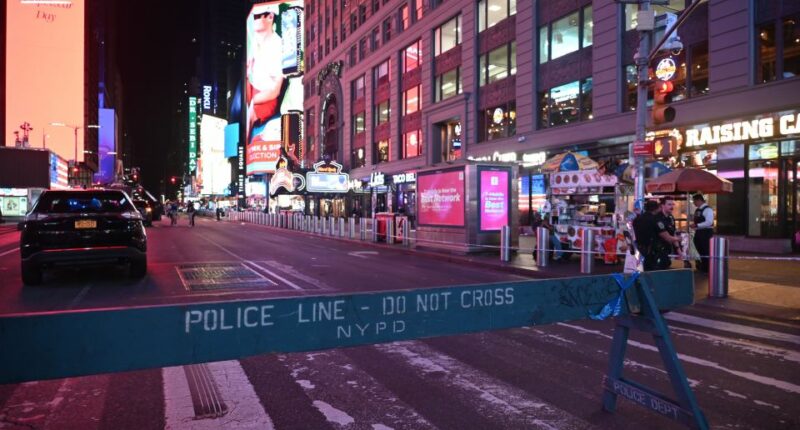 Police barricade in Times Square following a shooting.