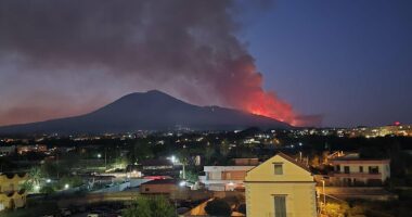 Huge flames break out around volcano as blazes sweep through Europe