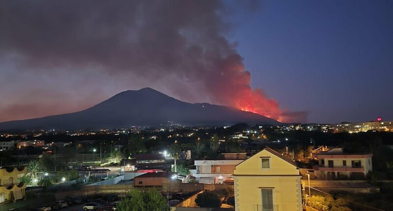 Huge flames break out around volcano as blazes sweep through Europe