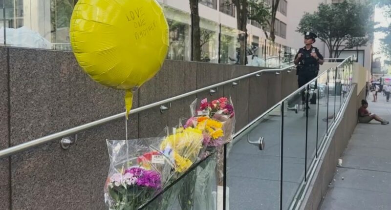 Hundreds honor security guard killed in New York office tower shooting