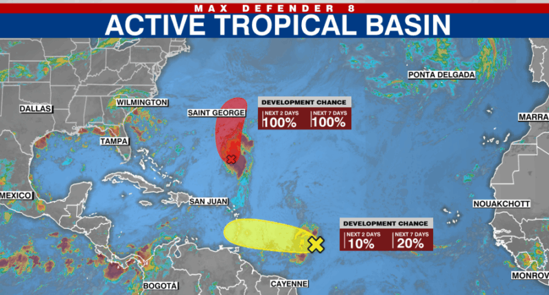 Hurricane Erin heads back out to sea, NHC monitoring two low-pressure areas