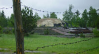 Barbed wire fence in front of an abandoned Soviet-era nuclear missile base.