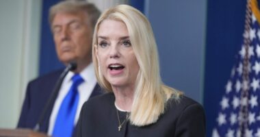 Pam Bondi speaking from a podium