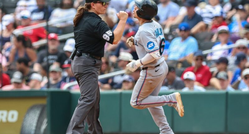 Jen Pawol breaks MLB's gender barrier as the first female umpire to work a regular-season game