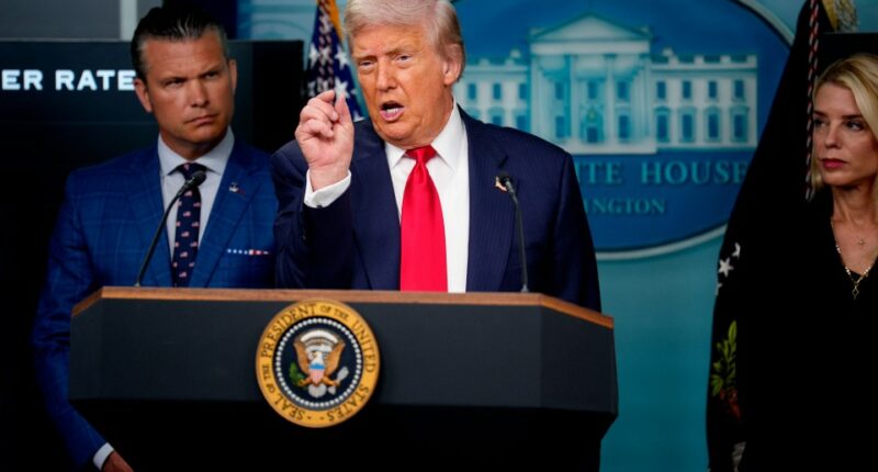 President Trump speaking at a press conference.