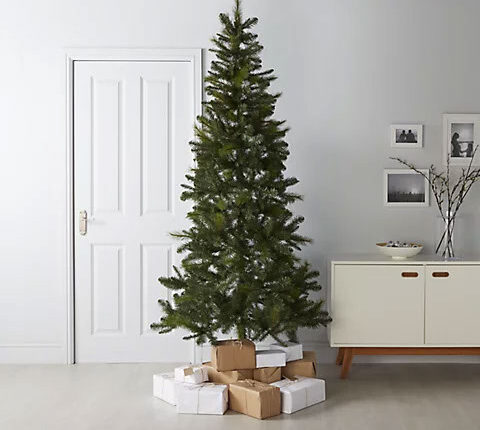 7.6ft artificial Christmas tree surrounded by presents.