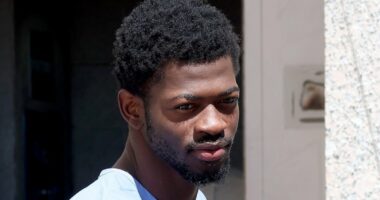 Lil Nas X wears blue prison jumpsuit while leaving LA court