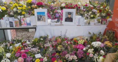 A floral tribute at Wangaratta Police Station is growing.