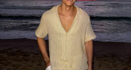 Photo of Yago Luiz de Campos e Silva on a beach at sunset.