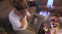 Firouzeh Firouzabadi with a photo of her son Reza Zavvar.