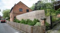 Man who put up 'hideous' privacy fence finally loses war with council