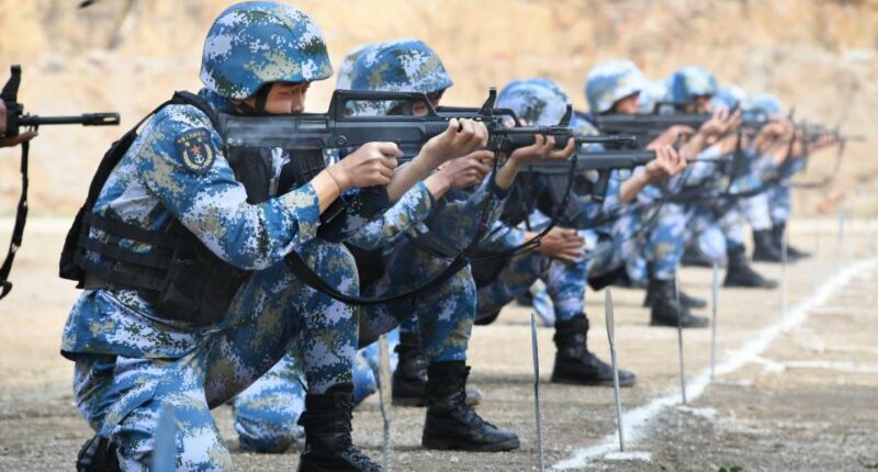 Chinese marines participating in a riflery competition.