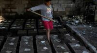 Migrants returning to Venezuela face debt and harsh living conditions