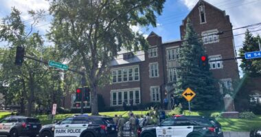 Police and first responders at the scene of a school shooting in Minneapolis.