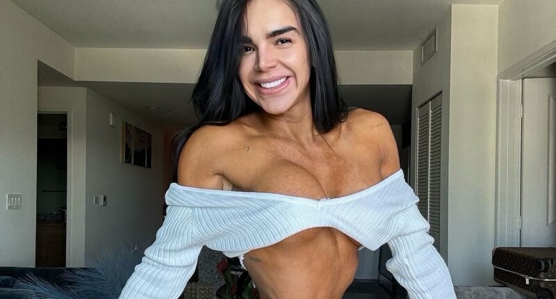 Model shrinks waist to 20 INCHES by wearing corset for 23 hours a day