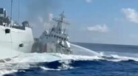 Damaged Chinese Coast Guard ship and Chinese Navy vessel after collision near Scarborough Shoal.