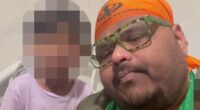 Moment accused killer parades his kids for the camera