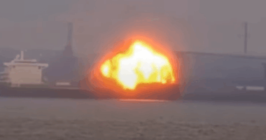 Large explosion near a ship.