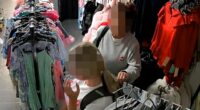 Moment brazen shoplifters stuff £100 of kids' clothes into rucksack