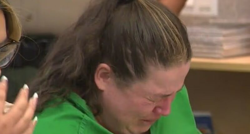 Woman crying in court.