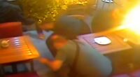 Moment gunman fires bullets into restaurant as rival gang run