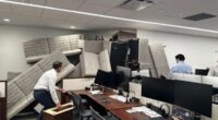 Moment terrified Blackstone hedge fund staff desperately build make-shift barricades to stop NYC gunman breaking in as he killed four in Manhattan skyscraper massacre