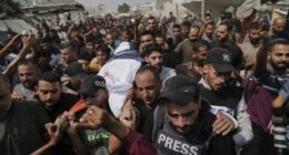 Mourners call to protect journalists after Israel's 'targeted assassination'
