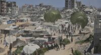 Palestinians rush to collect humanitarian aid