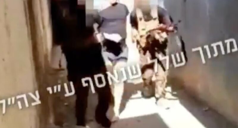 New October 7 footage shows Israeli led through Gaza by Hamas