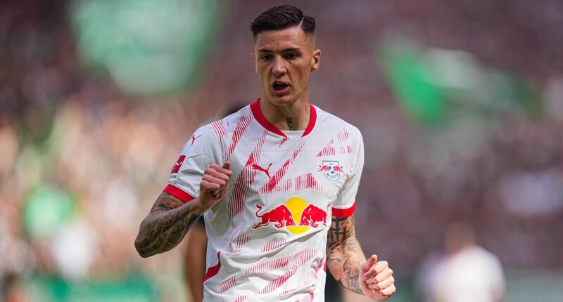 Newcastle make club-record £69.9m bid for RB Leipzig forward Benjamin Sesko as they look to beat Man United to striker's signature - with Alexander Isak's future at St James' Park still up in the air