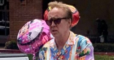 Nicolas Cage, 61, makes the rare move of wearing bright colors