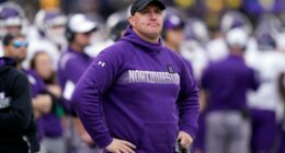 FILE - Northwestern head coach Pat Fitzgerald stands on the sideline during the first half of an NCAA college football game against Michigan, Oct. 23, 2021, in Ann Arbor, Mich. (AP Photo/Carlos Osorio, File)