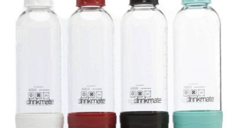 Four Drinkmate 1-liter carbonation bottles in white, red, black, and teal.