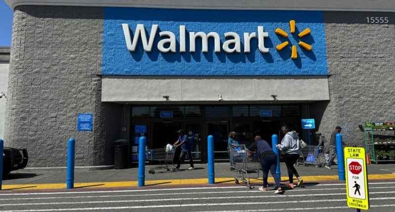 Customers entering a Walmart store.