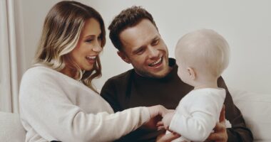 Olly Murs and his pregnant wife Amelia sweetly dote on their daughter