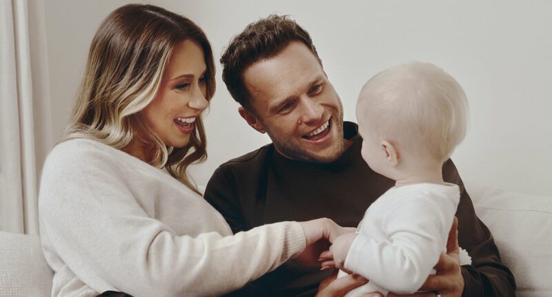 Olly Murs and his pregnant wife Amelia sweetly dote on their daughter