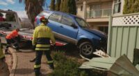 It's understood the driver may have been unconscious behind the wheel as the blue SUV was seen mounting a roundabout before disappearing through a park and towards houses.