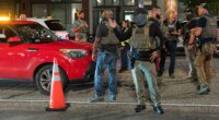 Police in DC get yelled at while setting up checkpoint along popular nightlife corridor