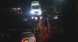 Police swarm home in Porepunkah amid search for alleged cop killer